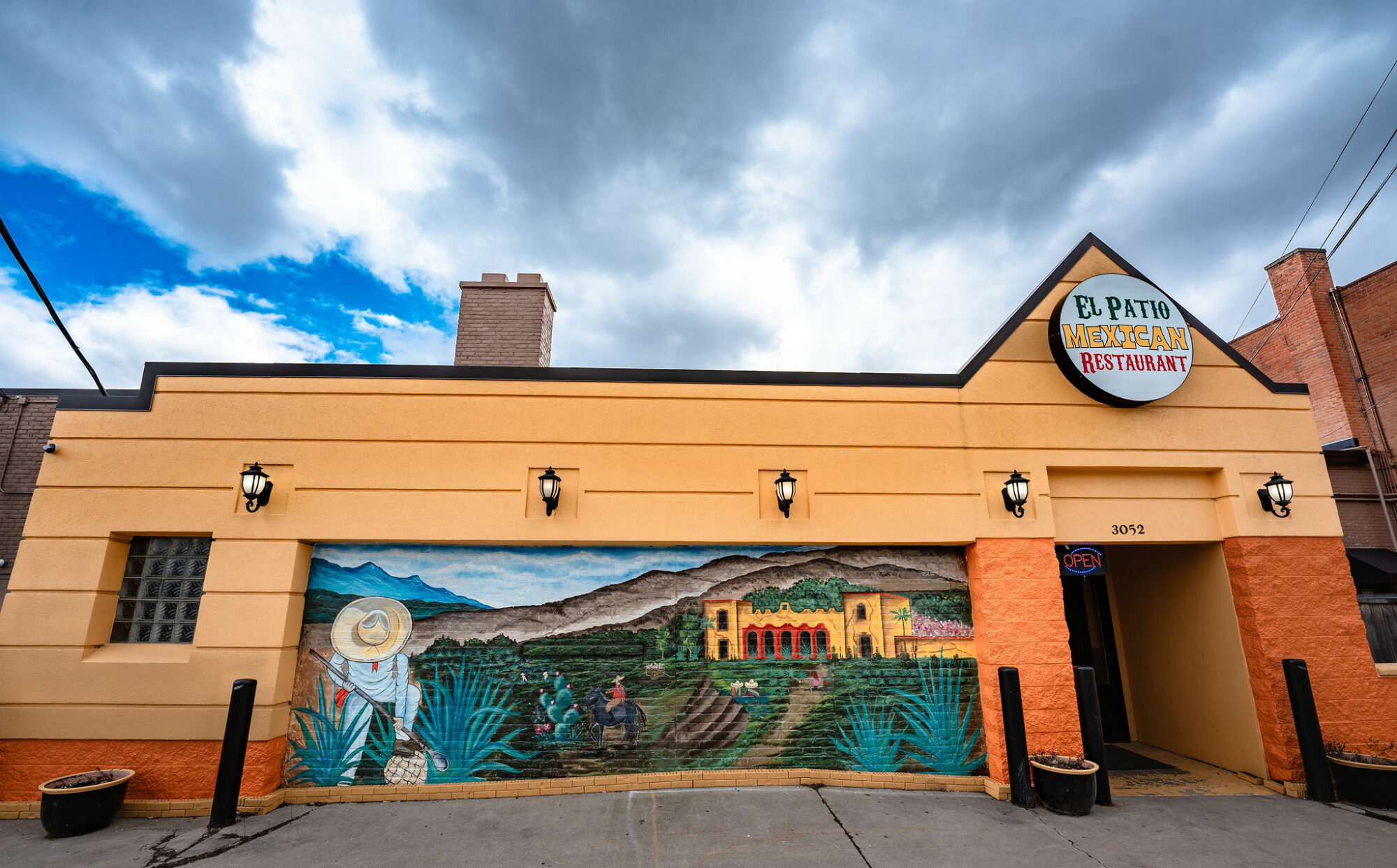 El Patio Mexican Restaurant exterior with mural artwork.
