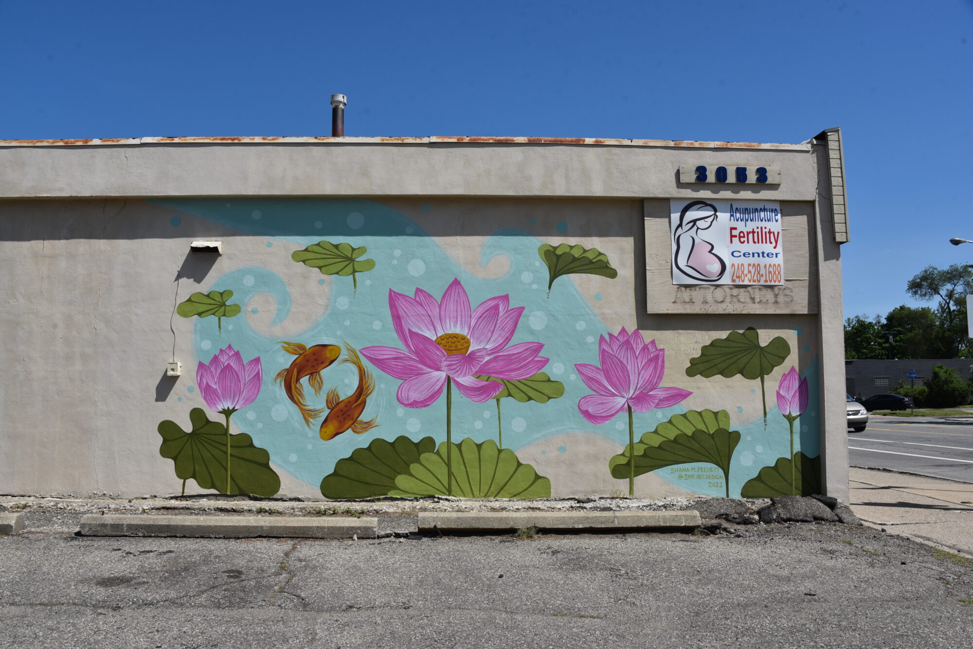 Lotus mural on fertility center building wall.