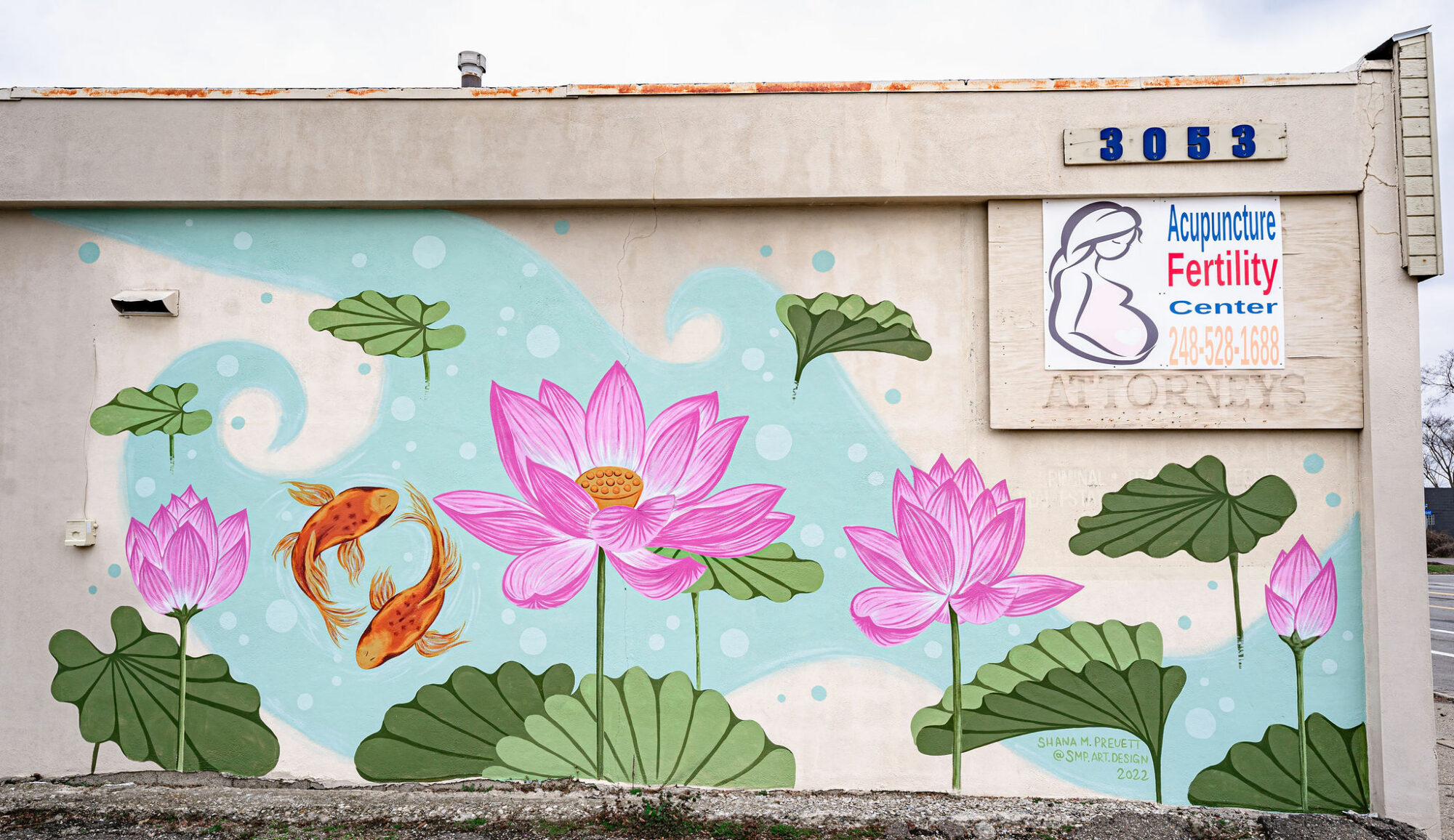 Mural with lotus flowers and koi fish.